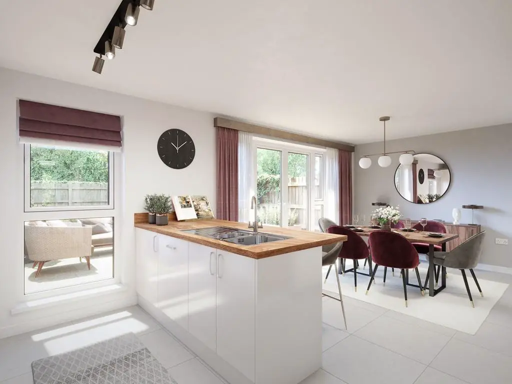 The open plan layout features double doors to...