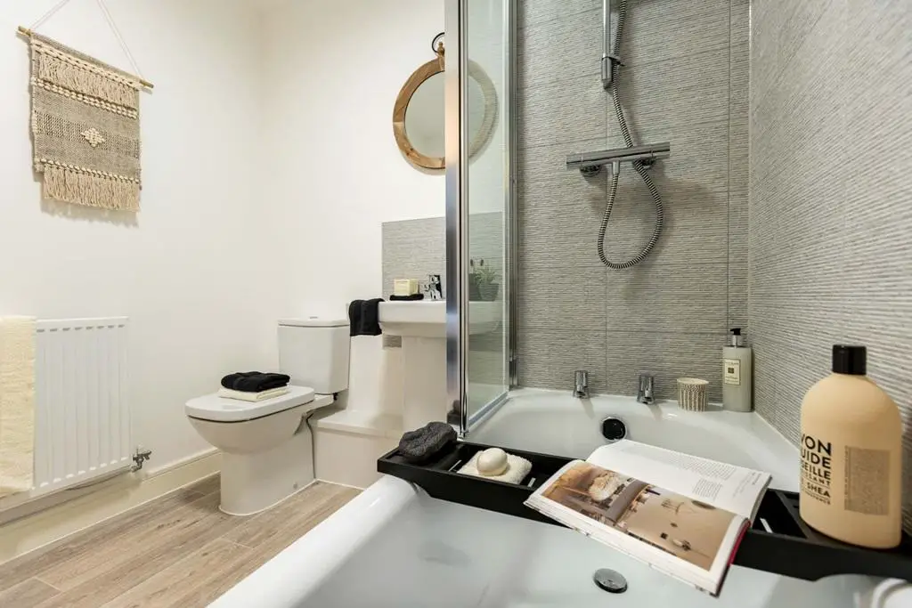 Unwind after a long day in this calming bathroom