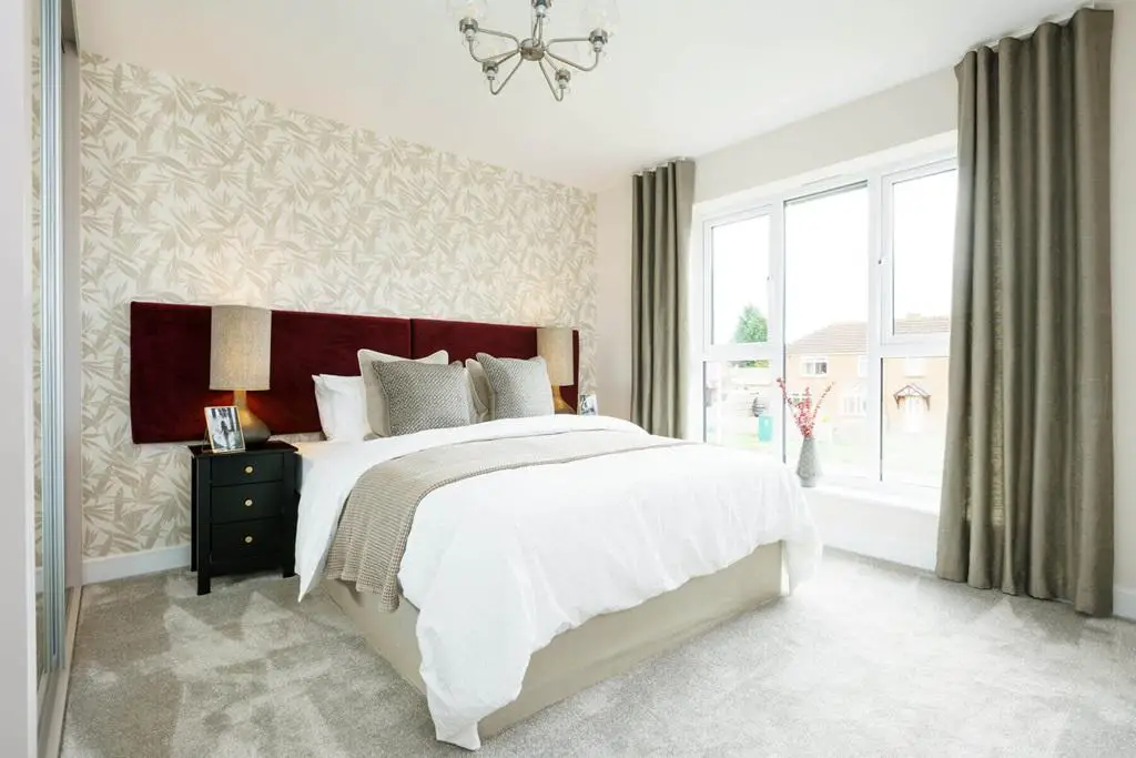 The spacious main bedroom offers the perfect...