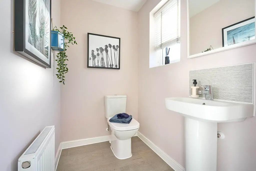 A guest cloakroom completes the ground floor