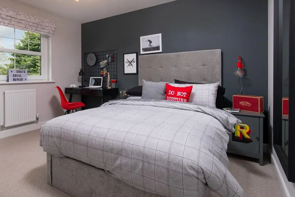 A spacious second double bedroom creating the...