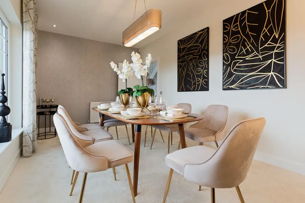 The dining area provides an inviting space to...