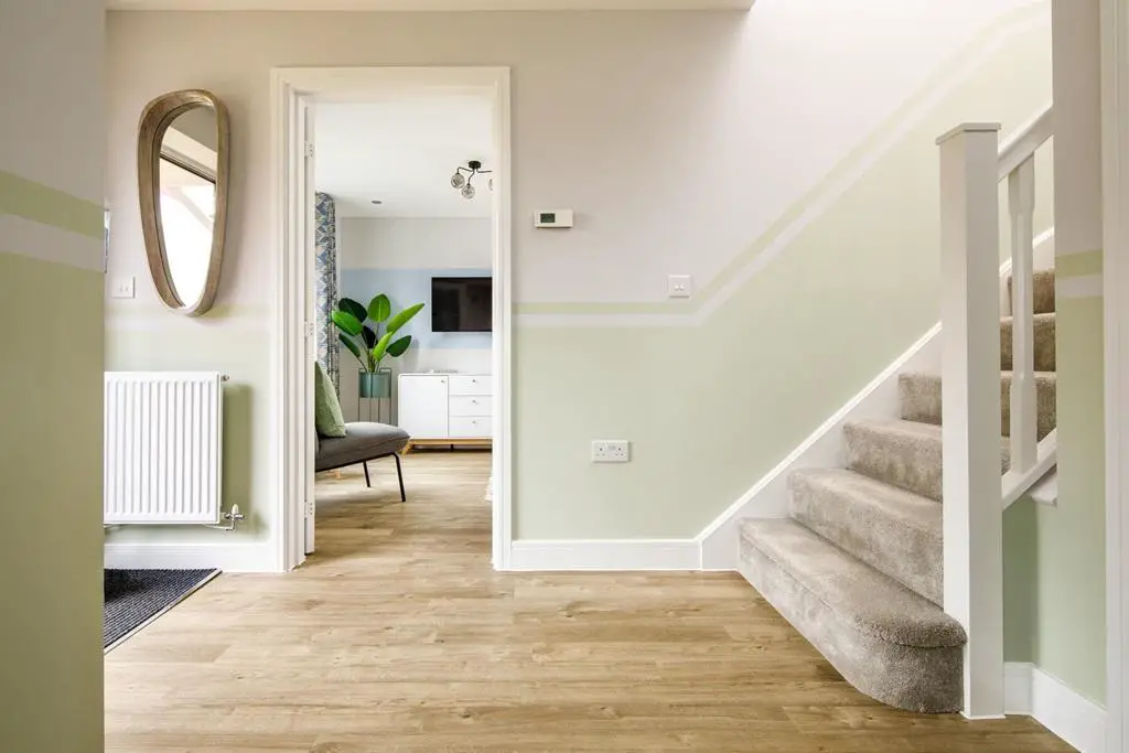 Step through the front door to a sizeable hallway