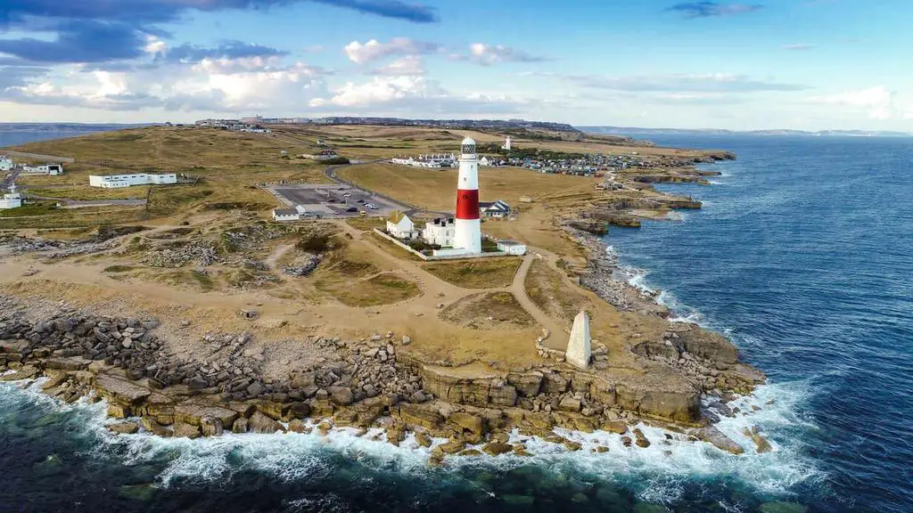 Aerial view of portland bill lighthouse with waves