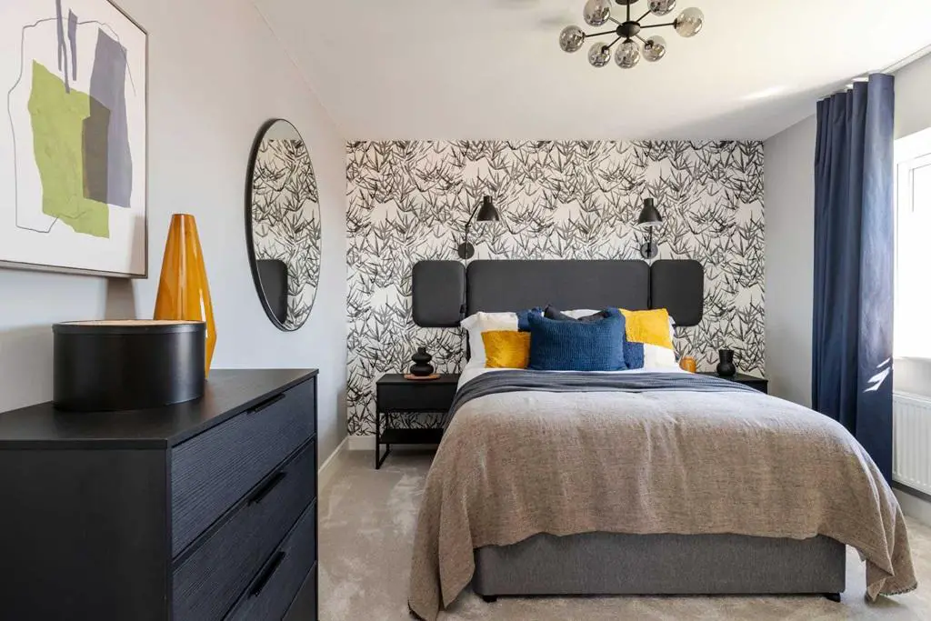 Bedroom 2 offers space for a double bed and...