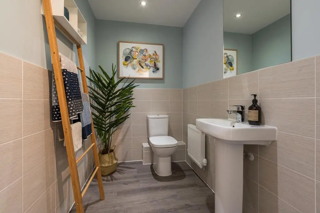 A stylish ground floor guest cloakroom