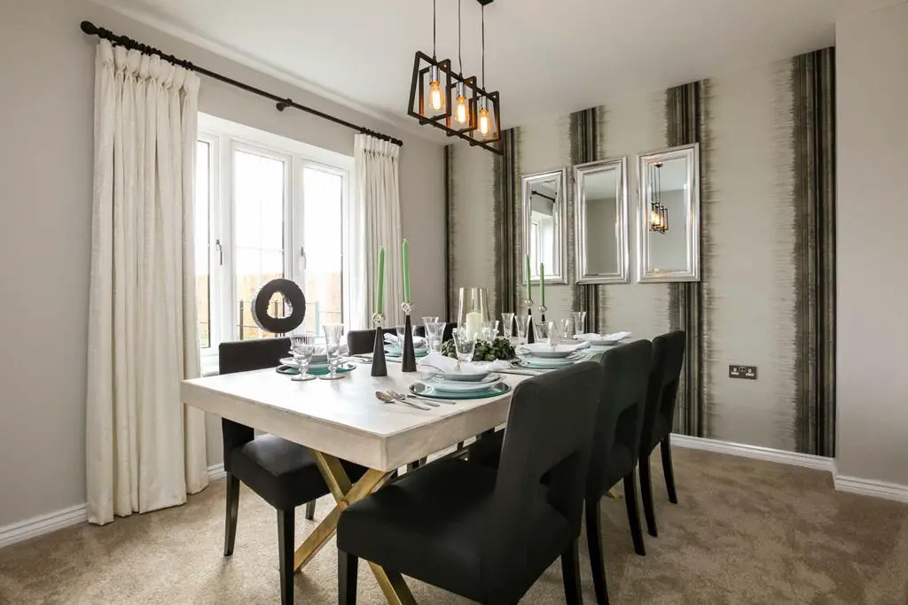 A formal dining room perfect for hosting dinner...
