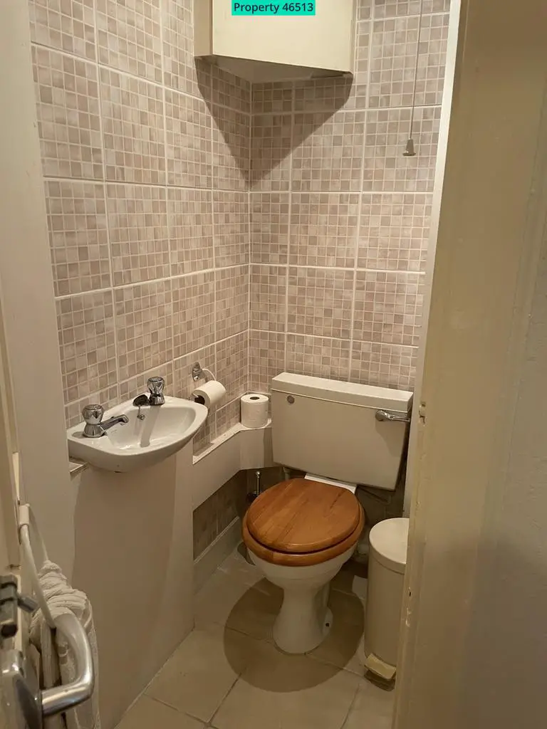 Fully tiled toilet and totally separate fomr the b