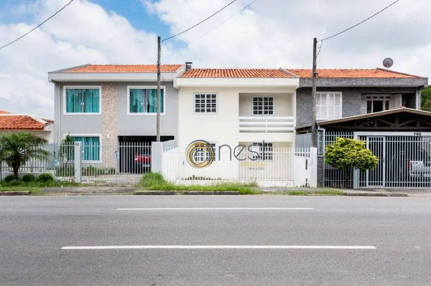 Foto 1 de Sobrado com 3 Quartos à venda, 132m² em Ahú, Curitiba