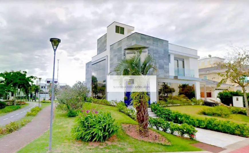 Foto 1 de Casa com 4 Quartos para alugar, 410m² em Jurerê Internacional, Florianópolis