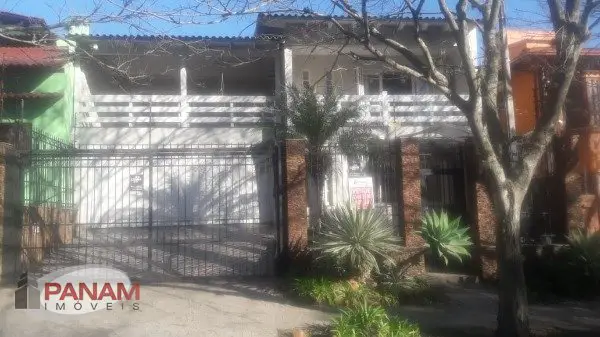 Foto 1 de Sobrado com 4 Quartos à venda, 368m² em Jardim Itú Sabará, Porto Alegre