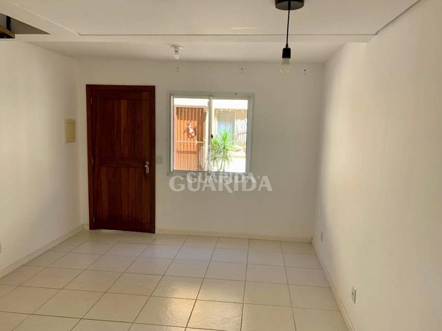 Foto 4 de Casa de Condomínio com 3 Quartos à venda, 65m² em Santa Tereza, Porto Alegre