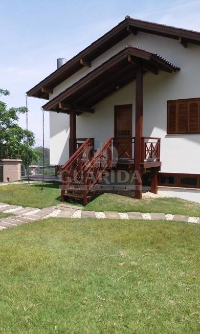 Foto 2 de Casa com 3 Quartos à venda, 300m² em Vila Nova, Porto Alegre