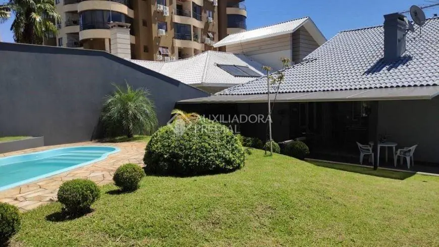 Foto 1 de Casa com 3 Quartos à venda, 200m² em Centro, Dois Irmãos