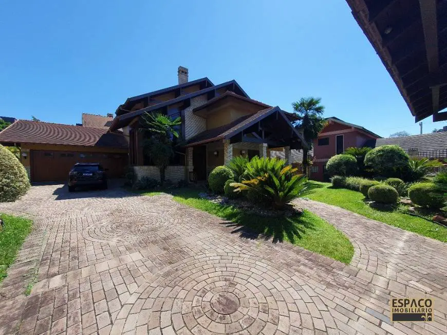 Foto 1 de Casa com 4 Quartos para alugar, 376m² em Planalto, Gramado
