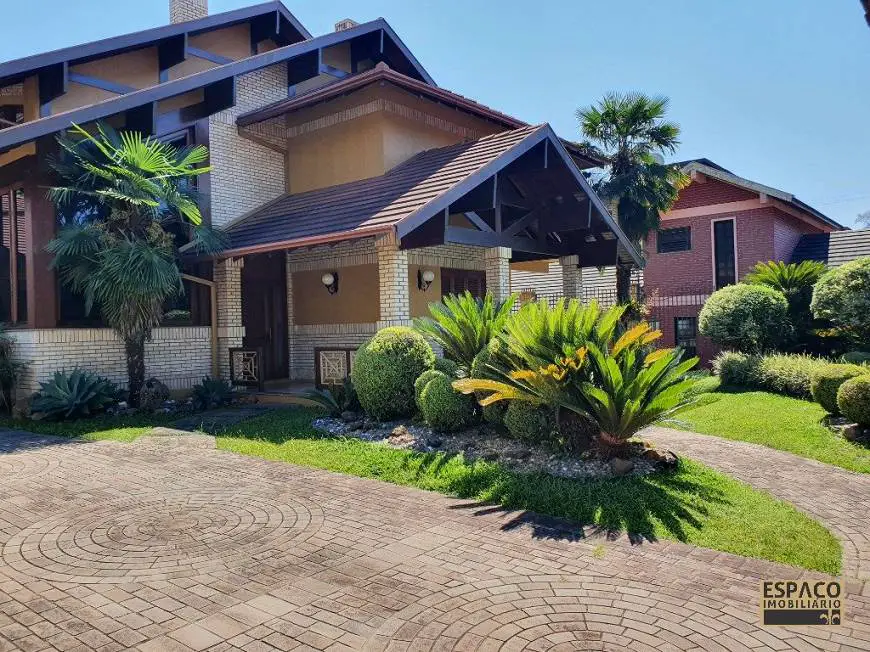Foto 4 de Casa com 4 Quartos para alugar, 376m² em Planalto, Gramado