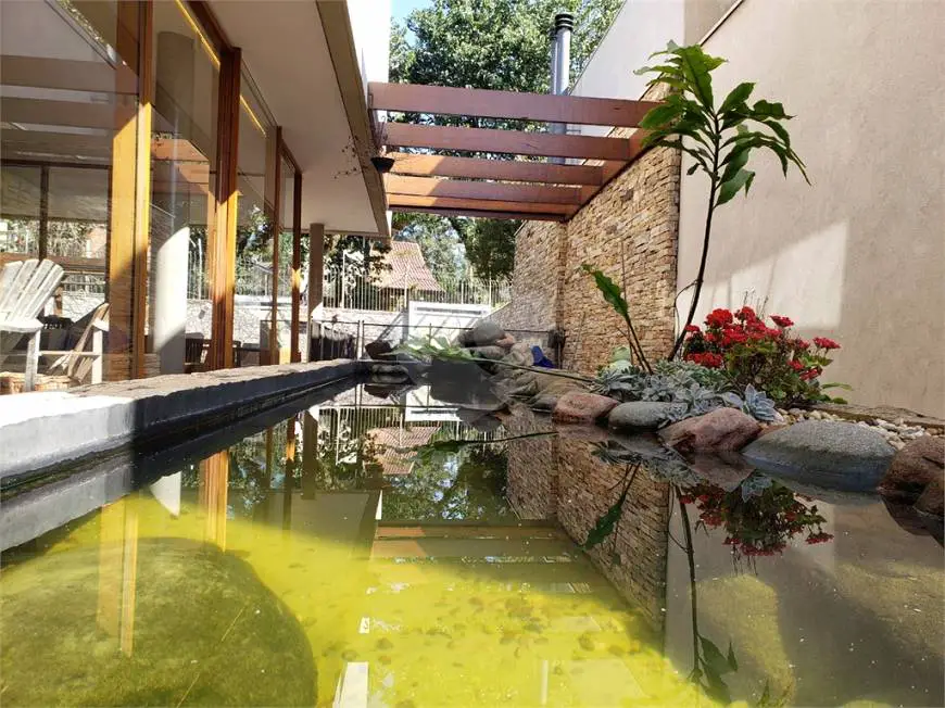Foto 1 de Casa de Condomínio com 4 Quartos à venda, 457m² em Chácara Flora, São Paulo