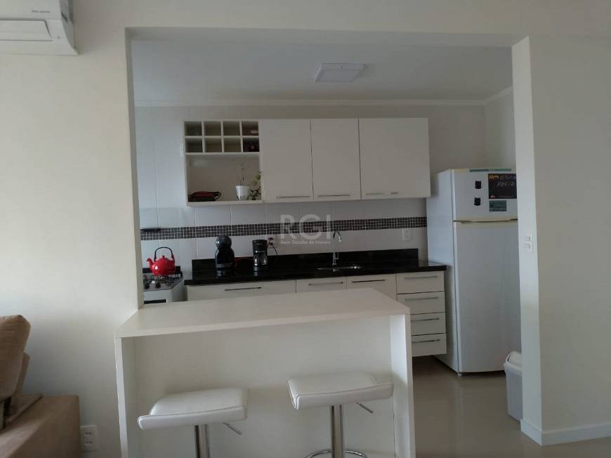 Foto 2 de Apartamento com 1 Quarto à venda, 48m² em Santo Antônio, Porto Alegre