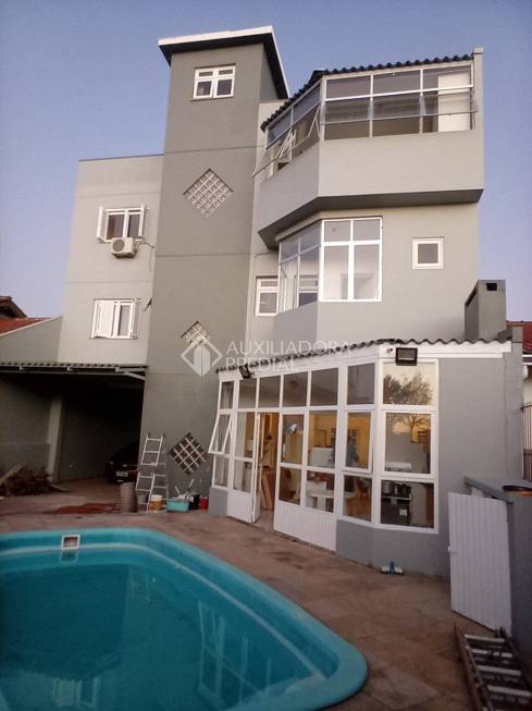 Foto 1 de Casa com 4 Quartos à venda, 468m² em Rubem Berta, Porto Alegre