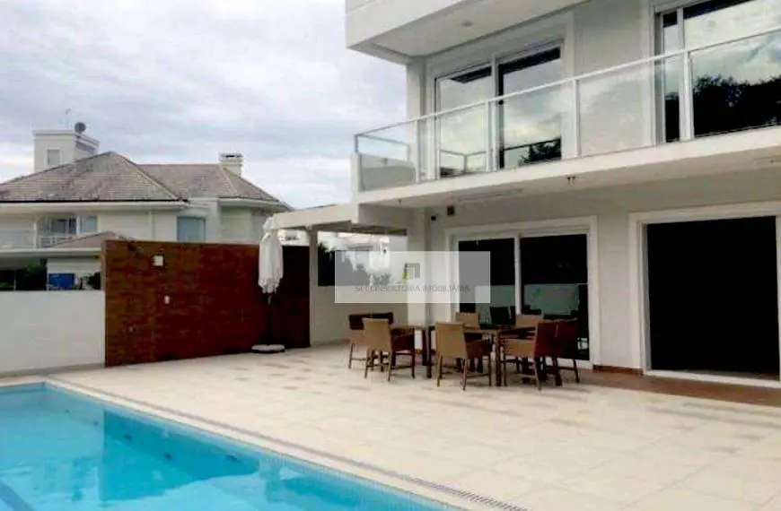 Foto 4 de Casa com 7 Quartos para alugar, 1100m² em Jurerê Internacional, Florianópolis