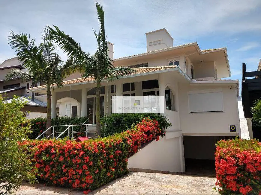 Foto 1 de Casa com 6 Quartos para venda ou aluguel, 450m² em Jurerê Internacional, Florianópolis