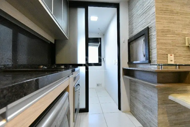 Foto 2 de Apartamento com 2 Quartos à venda, 65m² em Camaquã, Porto Alegre