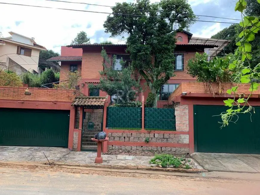 Foto 1 de Casa com 4 Quartos à venda, 309m² em Teresópolis, Porto Alegre