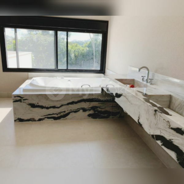 Foto 4 de Sobrado com 4 Quartos à venda, 650m² em Alphaville Flamboyant Residencial Araguaia, Goiânia