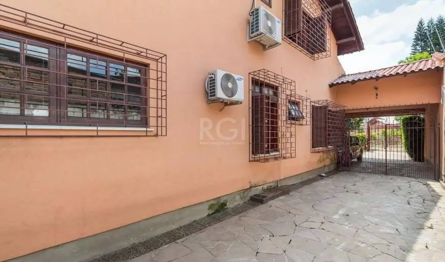 Foto 5 de Casa com 4 Quartos à venda, 257m² em Nonoai, Porto Alegre