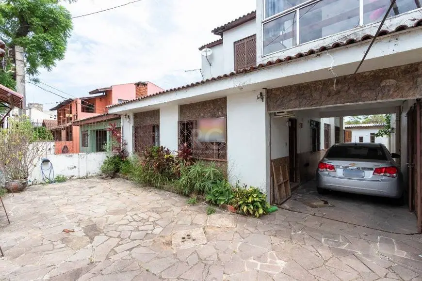 Foto 3 de Casa com 6 Quartos à venda, 149m² em Nonoai, Porto Alegre