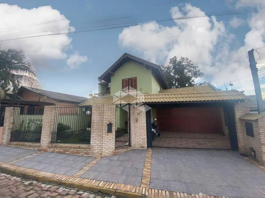 Foto 1 de Casa com 4 Quartos à venda, 152m² em Centro, Santa Cruz do Sul
