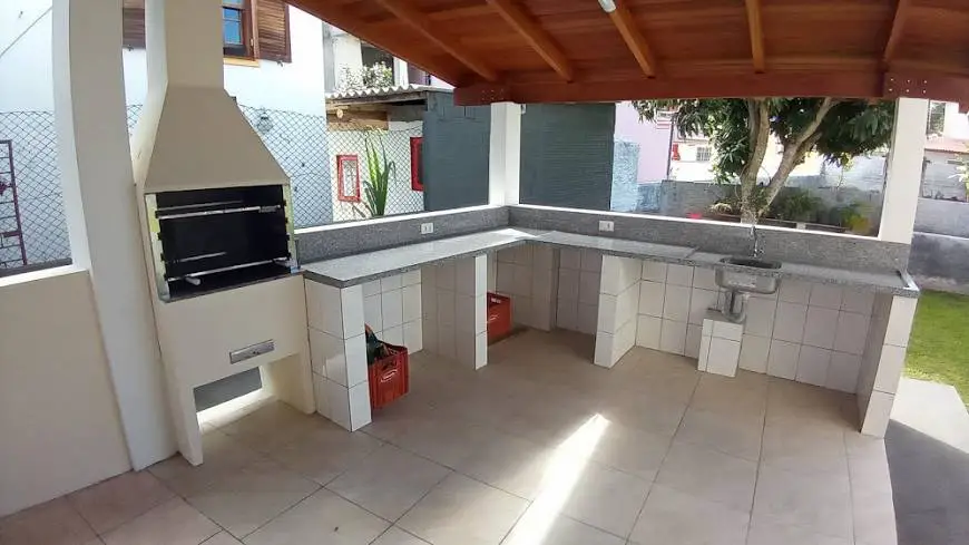 Foto 1 de Sobrado com 4 Quartos à venda, 250m² em Canasvieiras, Florianópolis