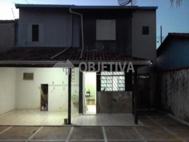 Foto 1 de Sobrado com 4 Quartos à venda, 211m² em Planalto, Uberlândia