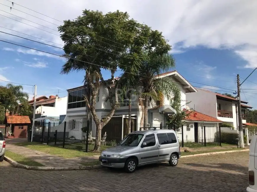 Foto 2 de Casa com 4 Quartos à venda, 167m² em Ipanema, Porto Alegre