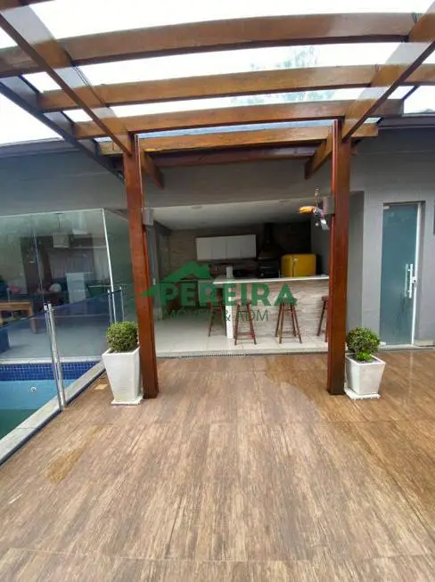 Foto 1 de Casa de Condomínio com 5 Quartos à venda, 640m² em Barra da Tijuca, Rio de Janeiro