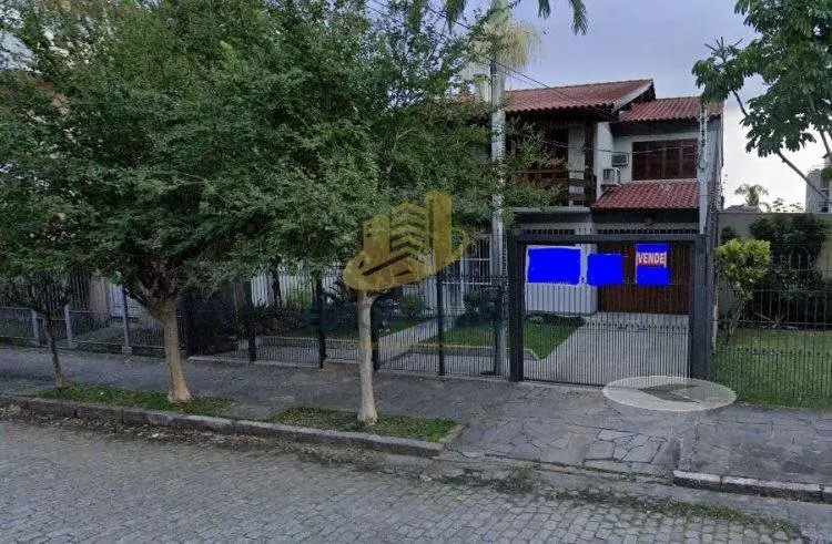 Foto 1 de Casa com 3 Quartos à venda, 297m² em Jardim Lindóia, Porto Alegre