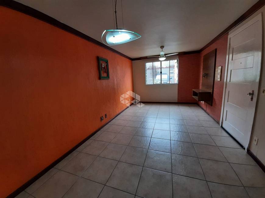 Foto 1 de Casa de Condomínio com 4 Quartos à venda, 86m² em Jardim Itú Sabará, Porto Alegre
