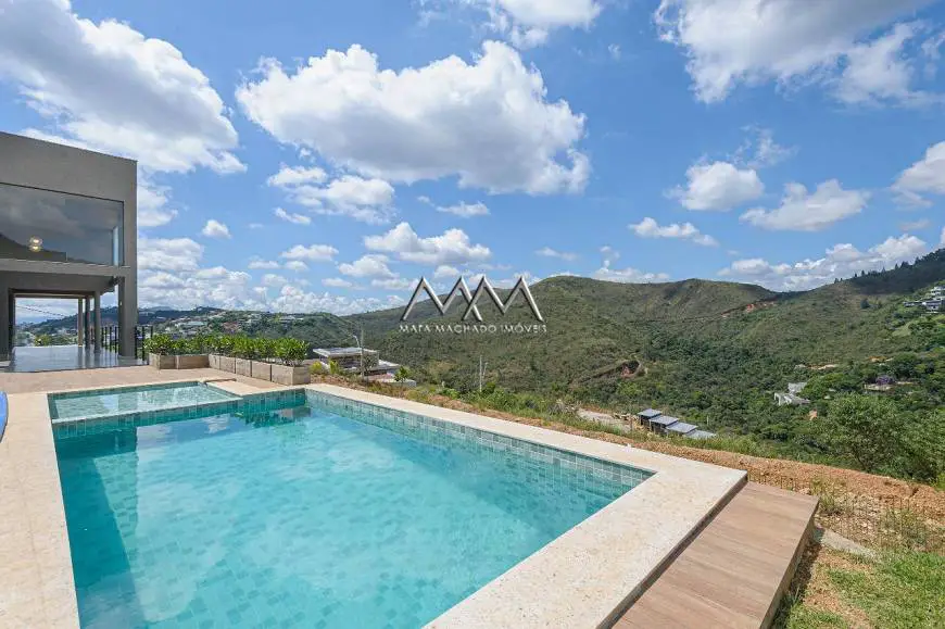 Foto 1 de Casa de Condomínio com 4 Quartos à venda, 340m² em Vila del Rey, Nova Lima