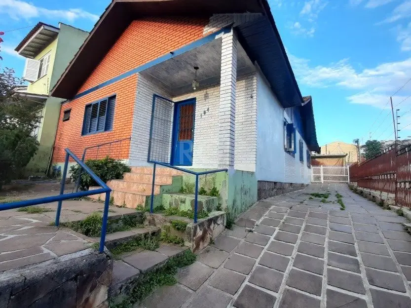 Foto 1 de Casa com 4 Quartos à venda, 184m² em Cavalhada, Porto Alegre
