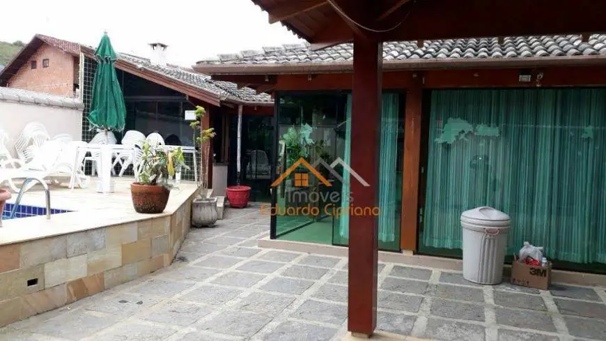 Foto 1 de Casa com 4 Quartos à venda, 200m² em Prainha, Caraguatatuba