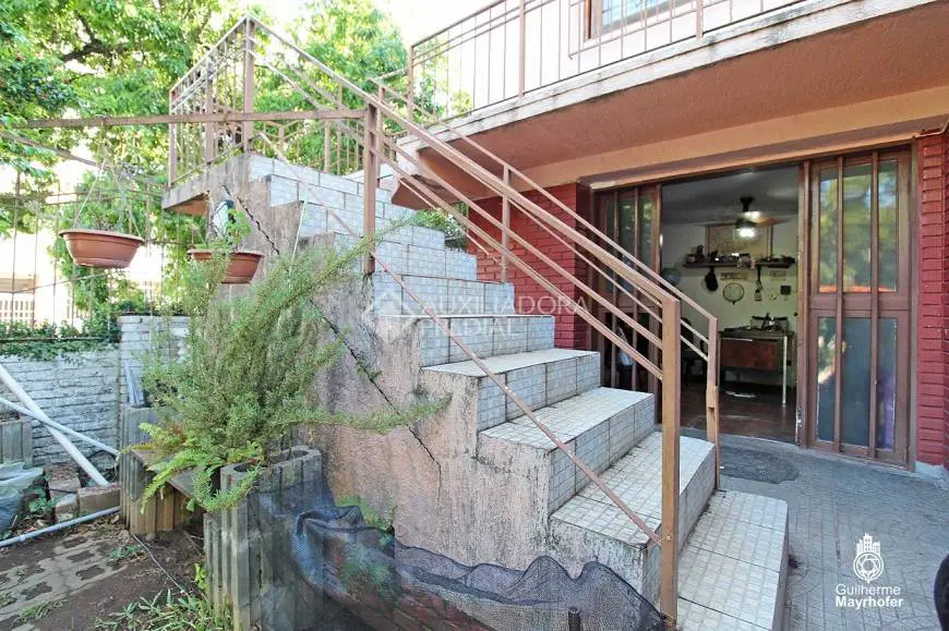 Foto 2 de Casa com 6 Quartos à venda, 300m² em Jardim do Salso, Porto Alegre