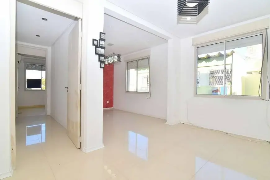 Foto 1 de Apartamento com 3 Quartos à venda, 62m² em Vila Nova, Porto Alegre
