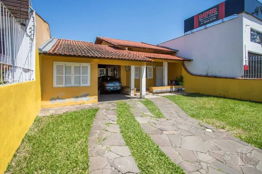 Foto 2 de Casa com 4 Quartos à venda, 329m² em Tristeza, Porto Alegre