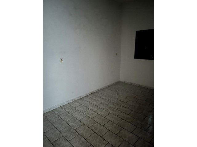 Foto 3 de Casa com 2 Quartos para alugar, 50m² em Segismundo Pereira, Uberlândia