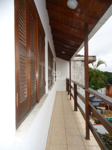Foto 1 de Casa com 4 Quartos para alugar, 300m² em Santo Antônio, Porto Alegre