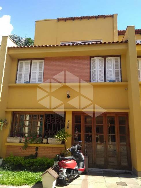 Foto 1 de Casa de Condomínio com 3 Quartos para alugar, 118m² em Medianeira, Porto Alegre