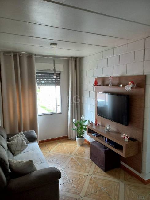 Foto 2 de Apartamento com 3 Quartos à venda, 69m² em Vila Nova, Porto Alegre