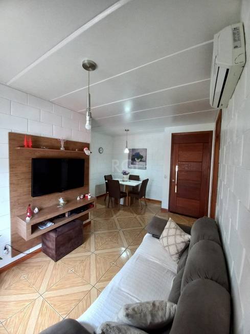 Foto 3 de Apartamento com 3 Quartos à venda, 69m² em Vila Nova, Porto Alegre
