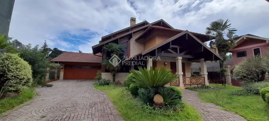 Foto 1 de Casa com 4 Quartos para alugar, 380m² em Planalto, Gramado
