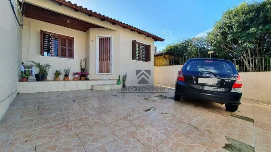 Foto 1 de Casa com 3 Quartos à venda, 74m² em Porto Verde, Alvorada